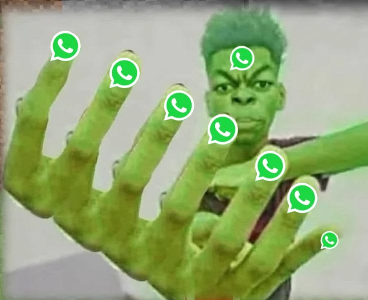A deep-fried image of a green-skinned man with green hair, WhatsApp logos on every fingertip and his forehead